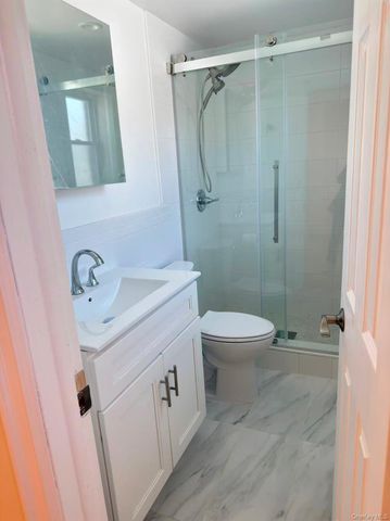 6925 69th Place, Maspeth, NY 11387