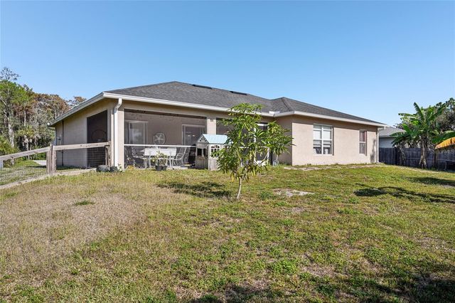 1910 LORNA AVENUE, Lehigh Acres, FL 33972