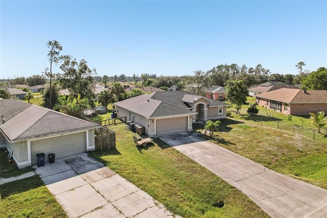 1910 LORNA AVENUE, Lehigh Acres, FL 33972