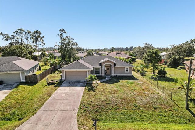 1910 LORNA AVENUE, Lehigh Acres, FL 33972