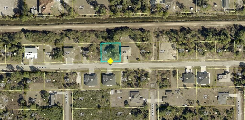 210 W 12th ST, LEHIGH ACRES, FL 33972 — exterior