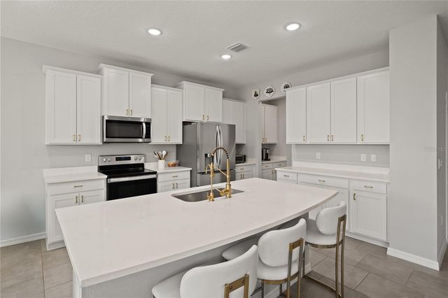 6199 WANDERING WILLOW DRIVE, Wesley Chapel, FL 33545