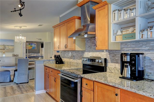 809 Lychee Drive, Barefoot Bay, FL 32976