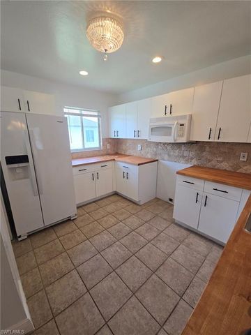 902 Adeline AVE, Lehigh Acres, FL 33971
