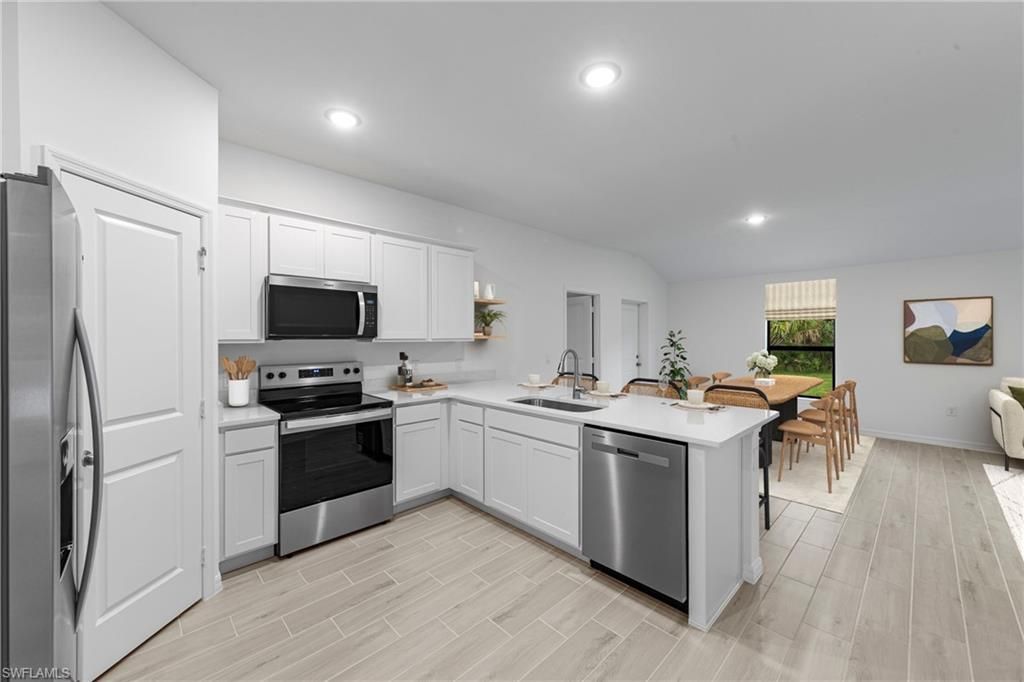 Image 8 of property listing at 1120 NE 34th ST, Cape Coral, FL 33909
