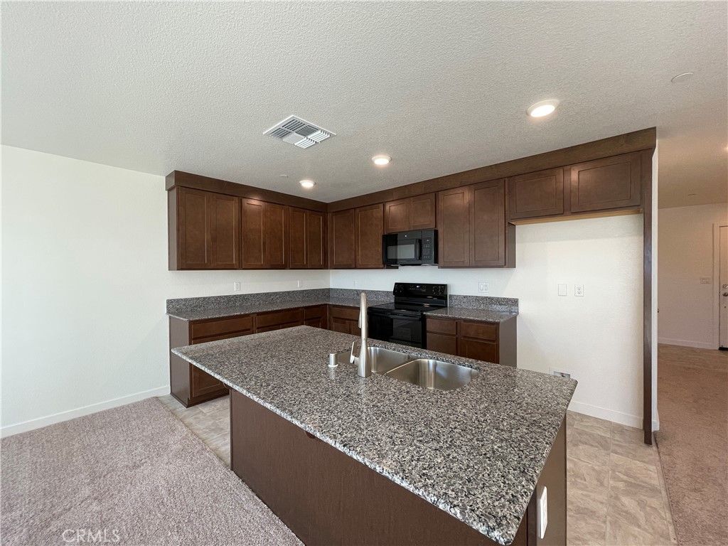 Image 1 of property listing at 708 Stone Ridge East Avenue, Merced, CA 95341