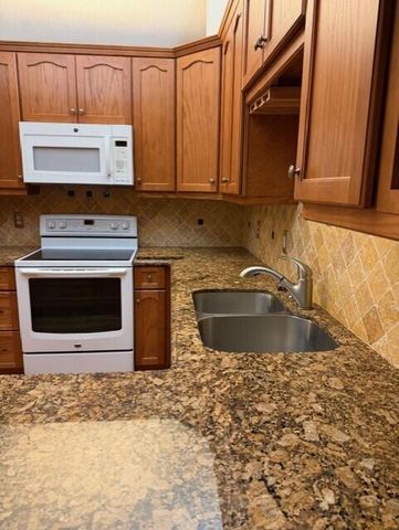 106 Freedon Court Court, Deerfield Beach, FL 33442