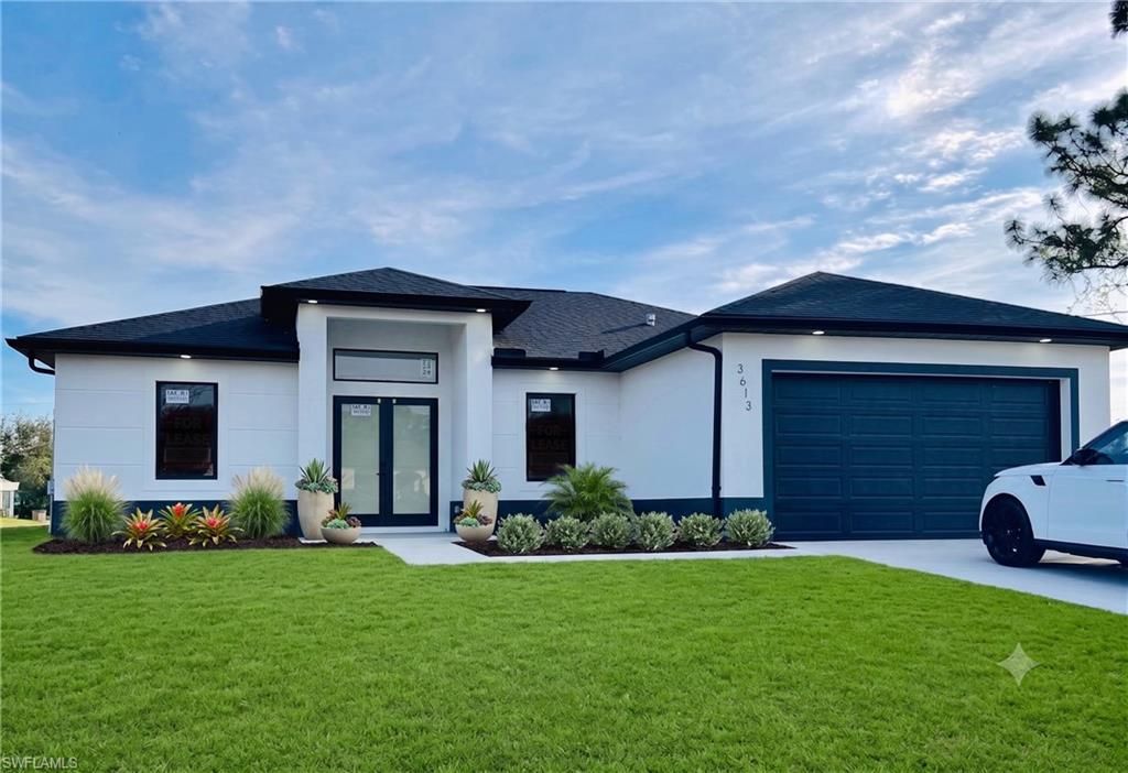 3613 18th ST W, LEHIGH ACRES, FL 33971 — exterior