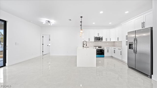 1941 NE 15th ST, Cape Coral, FL 33909