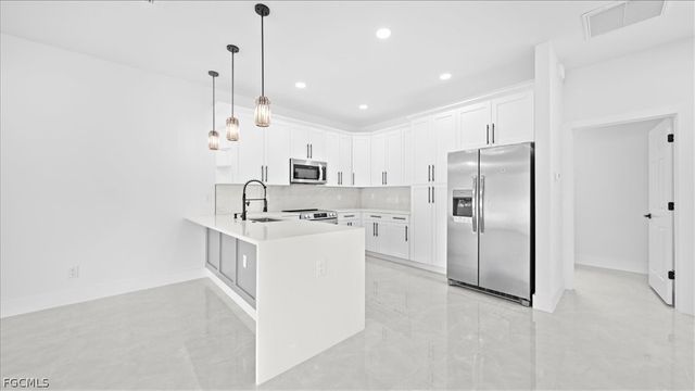 1941 NE 15th ST, Cape Coral, FL 33909