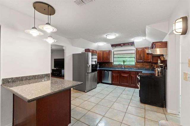 16502 E COURSE DRIVE, Tampa, FL 33624