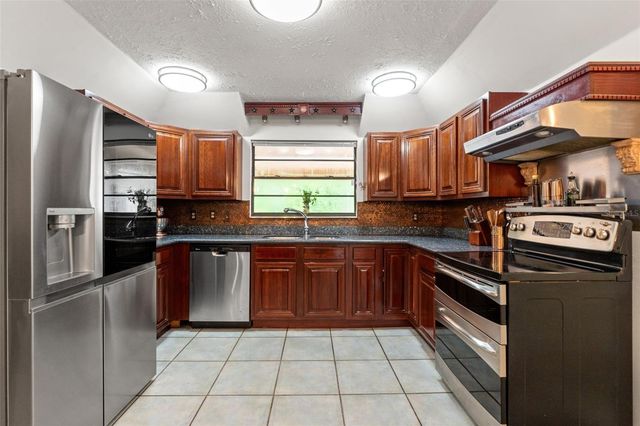 16502 E COURSE DRIVE, Tampa, FL 33624