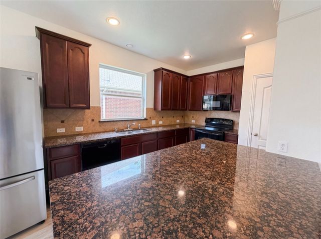 895 Honey Locust Drive, Fate, TX 75087