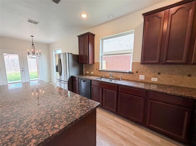 895 Honey Locust Drive, Fate, TX 75087