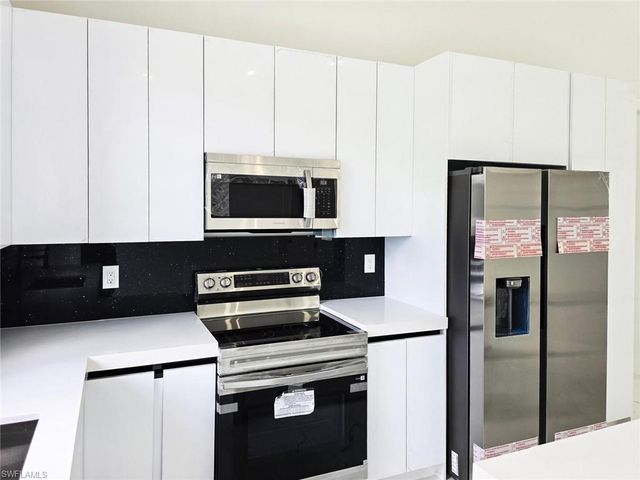 1411 Moore AVE, Lehigh Acres, FL 33972