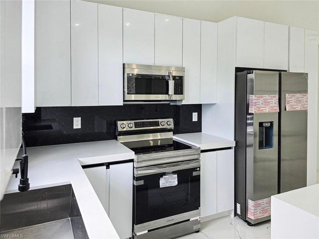 1411 Moore AVE, Lehigh Acres, FL 33972