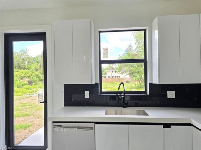 1411 Moore AVE, Lehigh Acres, FL 33972