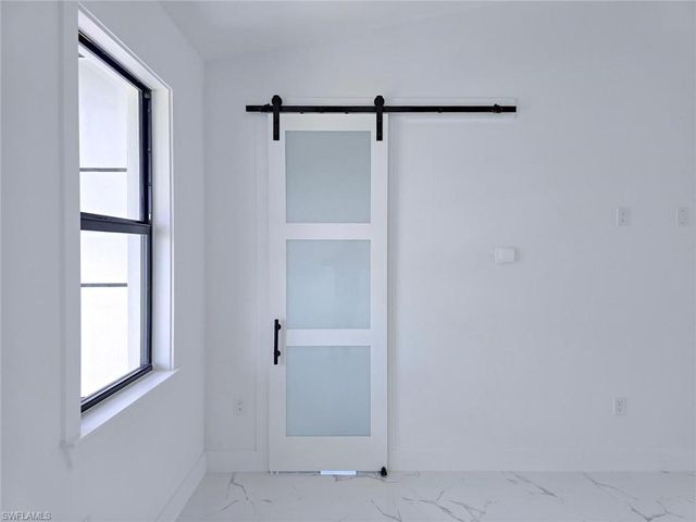 1411 Moore AVE, Lehigh Acres, FL 33972