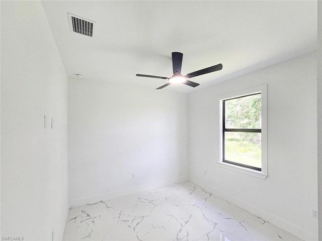 1411 Moore AVE, Lehigh Acres, FL 33972