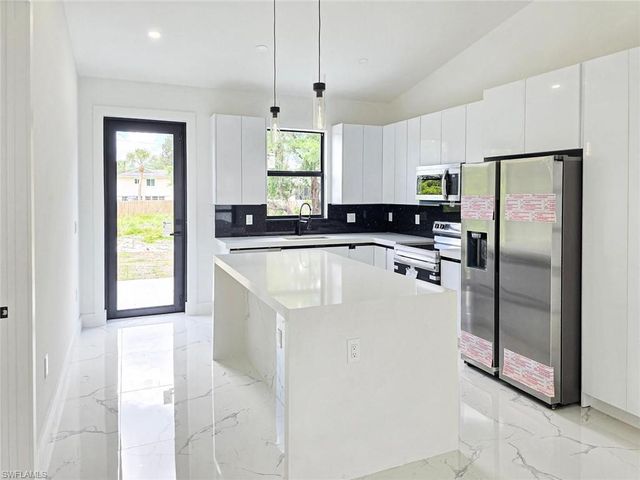 1411 Moore AVE, Lehigh Acres, FL 33972