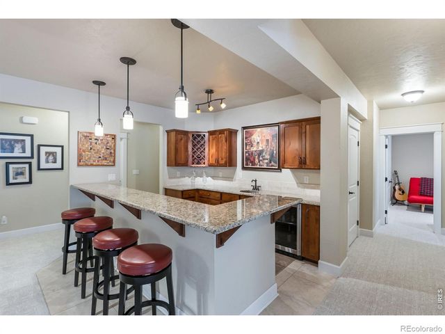 6741 Pumpkin Ridge Drive, Windsor, CO 80550