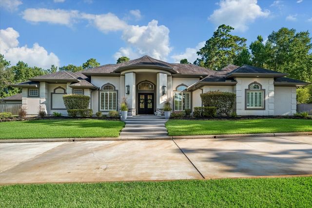 11 Turtle Cove Court, Kingwood, TX 77346