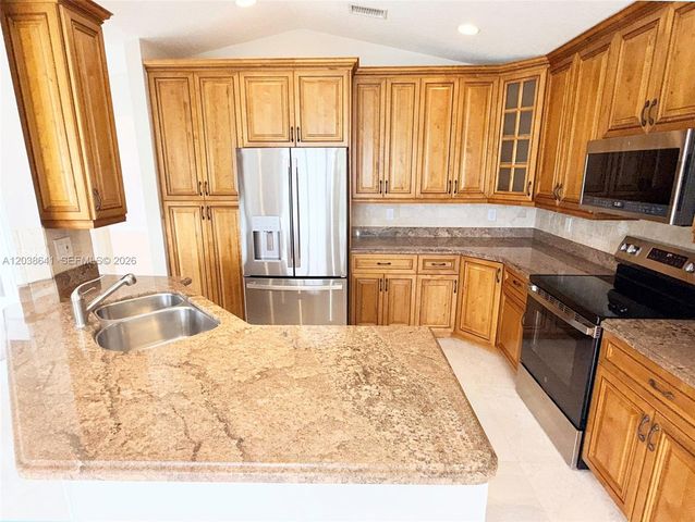 1212 Falls Boulevard, Weston, FL 33327