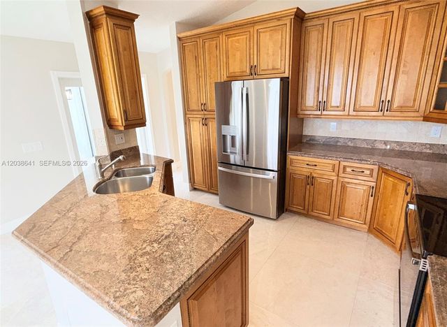 1212 Falls Boulevard, Weston, FL 33327