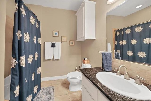 7039 Kingston Cove Lane 202, Willis, TX 77318