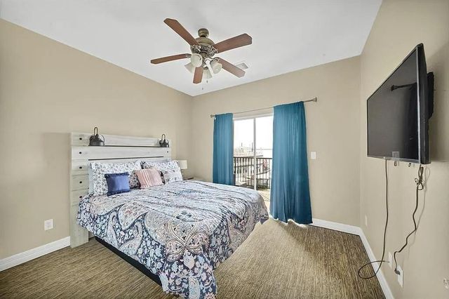 7039 Kingston Cove Lane 202, Willis, TX 77318