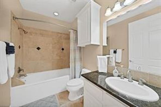 7039 Kingston Cove Lane 202, Willis, TX 77318