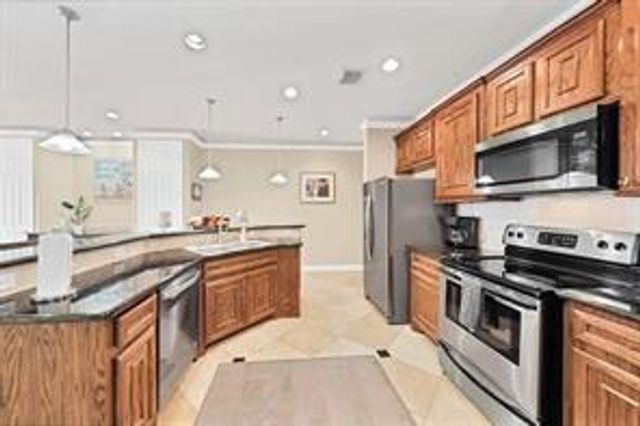 7039 Kingston Cove Lane 202, Willis, TX 77318