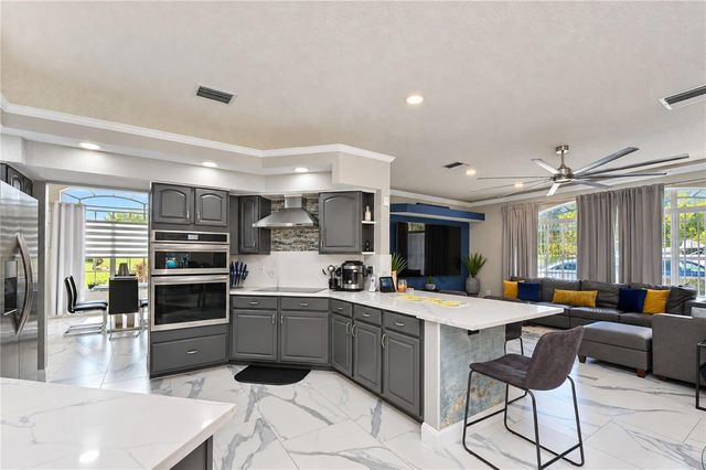 7136 QUAIL HOLLOW BOULEVARD, Wesley Chapel, FL 33544