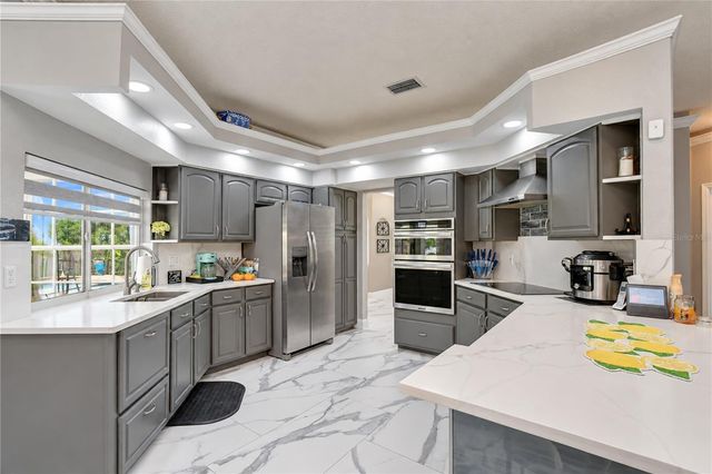 7136 QUAIL HOLLOW BOULEVARD, Wesley Chapel, FL 33544