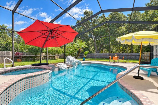 7136 QUAIL HOLLOW BOULEVARD, Wesley Chapel, FL 33544