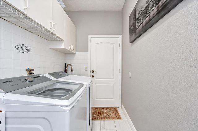 7136 QUAIL HOLLOW BOULEVARD, Wesley Chapel, FL 33544