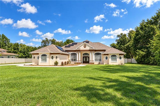 7136 QUAIL HOLLOW BOULEVARD, Wesley Chapel, FL 33544