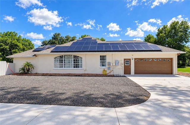7136 QUAIL HOLLOW BOULEVARD, Wesley Chapel, FL 33544