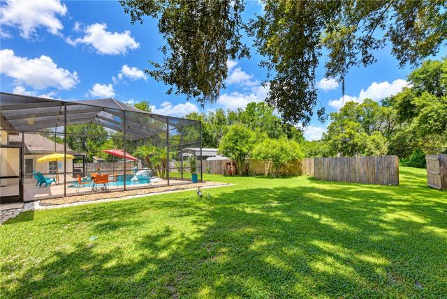7136 QUAIL HOLLOW BOULEVARD, Wesley Chapel, FL 33544