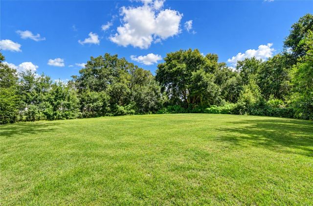 7136 QUAIL HOLLOW BOULEVARD, Wesley Chapel, FL 33544