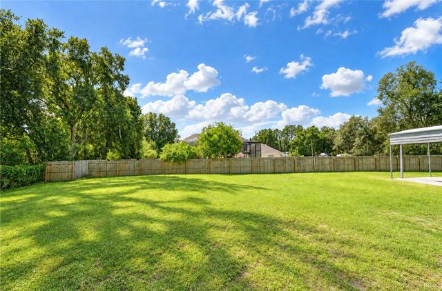 7136 QUAIL HOLLOW BOULEVARD, Wesley Chapel, FL 33544