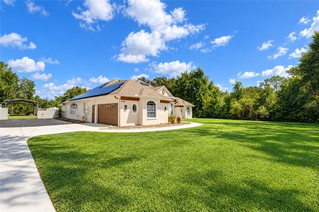7136 QUAIL HOLLOW BOULEVARD, Wesley Chapel, FL 33544