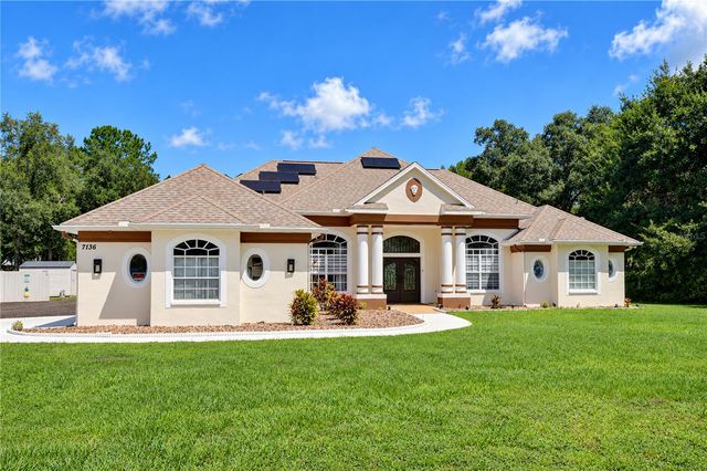 7136 QUAIL HOLLOW BOULEVARD, Wesley Chapel, FL 33544