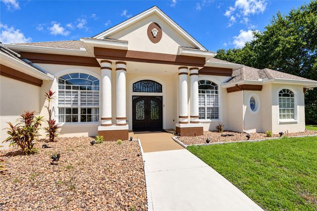 7136 QUAIL HOLLOW BOULEVARD, Wesley Chapel, FL 33544