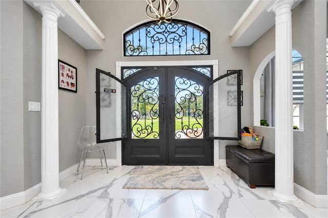 7136 QUAIL HOLLOW BOULEVARD, Wesley Chapel, FL 33544