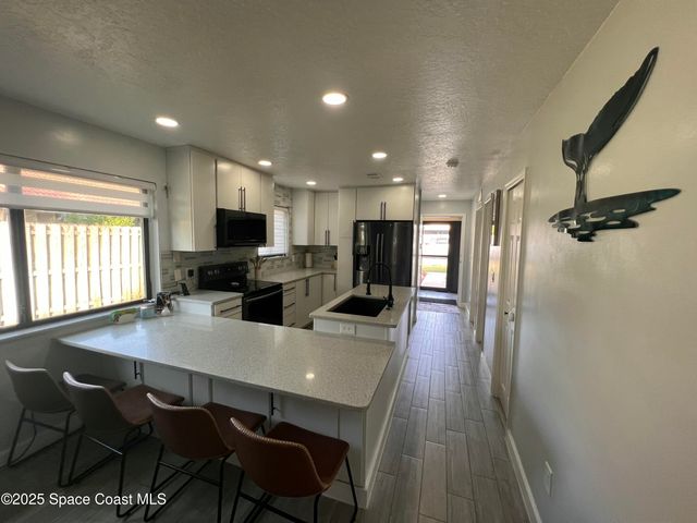 3230 Sand Dunes Court, Melbourne Beach, FL 32951