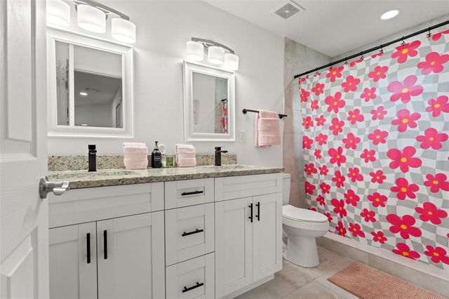 7911 N PACKWOOD AVENUE, Tampa, FL 33604