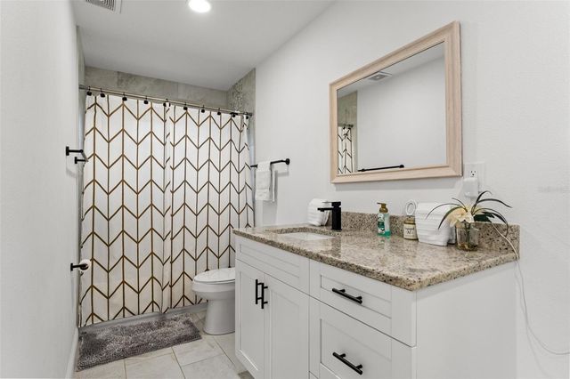 7911 N PACKWOOD AVENUE, Tampa, FL 33604