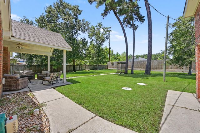 7110 Nickaburr Creek Drive, Magnolia, TX 77354