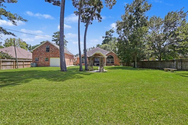7110 Nickaburr Creek Drive, Magnolia, TX 77354